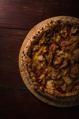 Delicious Pizza Burger Classic Homemade Tomato Sauce Sausage Cheese Onion Chicken Meat Pasta Shrimp Restaurant Menu Gourmet on a wooden table