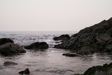 A picture of the beach taken at sunset.