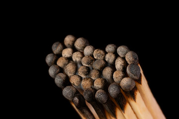 Group of burnt matches in the shape of a heart. Love concept