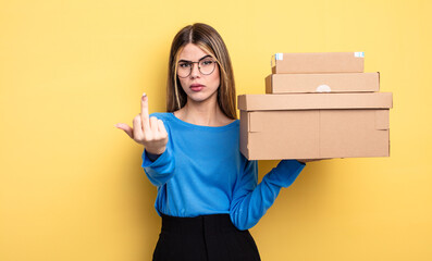 pretty woman feeling angry, annoyed, rebellious and aggressive packages boxes concept
