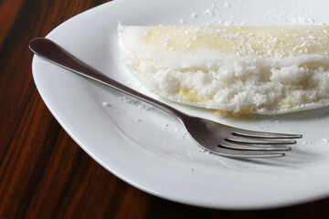 Brazilian food. Tapioca. Closeup of coconut tapioca. Flatbread made with cassava flour, coconut grated and condensed milk.