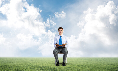 young businessman with book