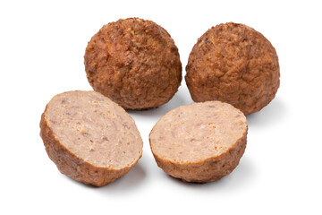 Whole and halved baked meatballs isolated on white background