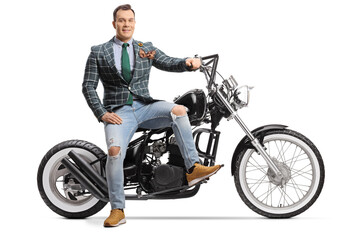 Fototapeta na wymiar Man in stylish clothes sitting on a chopper motorbike