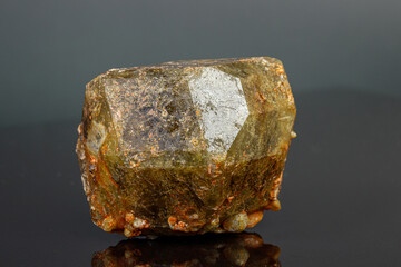 macro mineral stone Andradite on a black background