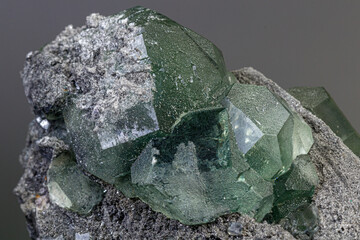 macro mineral stone green fluorite on a black background