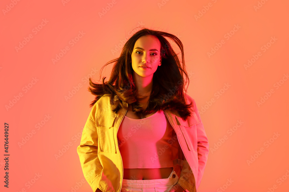 Canvas Prints pretty young woman in stylish clothes on color background