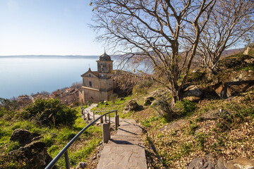 The Assumption of Mary Church  with a wide view surrounding the observer town Trevignano...