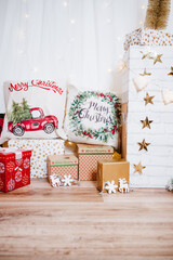 beautiful christmas decoration at home. Chimney, gifts, tree, noel, cushions on beautiful indoor white studio. Christmas concept. Nobody