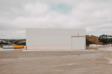 Warehouse with an empty Parking Lot