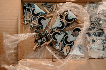 Bolts, furniture wheels and accessories for assembling furniture parts