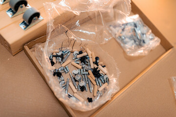 Bolts, furniture wheels and accessories for assembling furniture parts