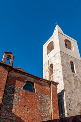 Oratory of the Holy Cross and church bell tower, historic center of Cascina, Pisa, Italy