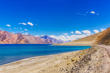Fototapeta premium Mountains and Pangong tso Lake. It is huge lake in Ladakh, shared by China and India along India China LOC border , long and extends from India to Tibet. Leh, Ladakh, Jammu and Kashmir, India