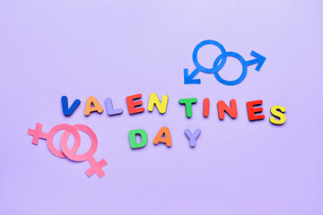 Text VALENTINES DAY with symbols of woman and man on color background. LGBT concept