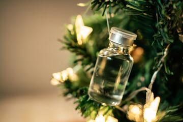 Vaccine vial on a Christmas tree