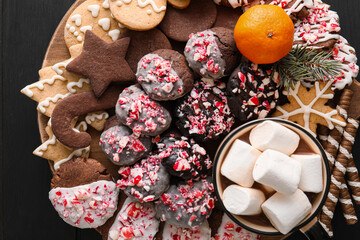 Different Christmas cookies on table