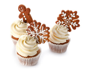 Tasty cupcakes with gingerbread cookies on white background