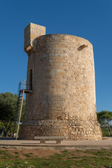 Fototapeta na wymiar Medieval tower Torre Nova in Cala Santanyi