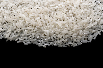 white rice on a black isolated background