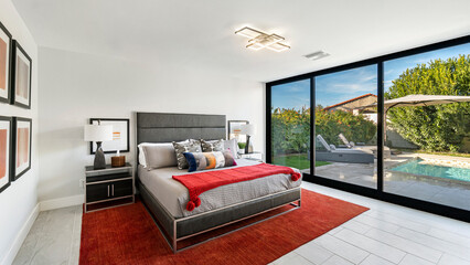 Luxury Bedroom with a sliding glass door. 