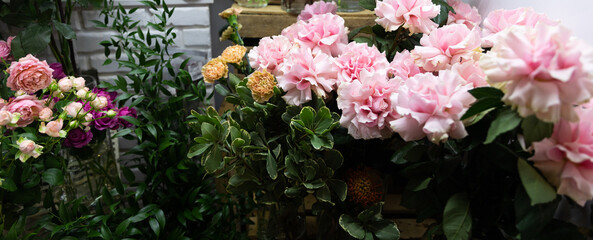 fresh cut roses in delicate tones in a flower shop