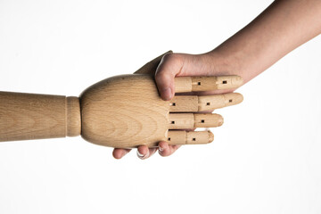 handshake of wooden hand and live