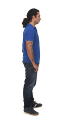 Fototapeta premium side view of a man with ponytail on white background