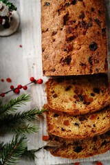 Homemade Xmas fruit cake or Indian tutti frutti bread on Christmas holiday background, selective focus