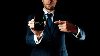 Sell and buy. Investment business technology app on digital screen in businessman hands. Finance application for sell, buy and analysis profit dividend statistics. Candlestick chart banner.