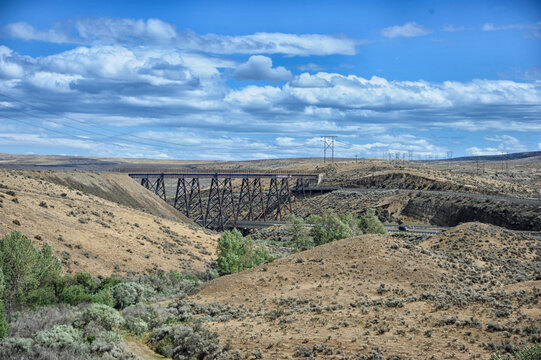 Train trestle over desert canyon