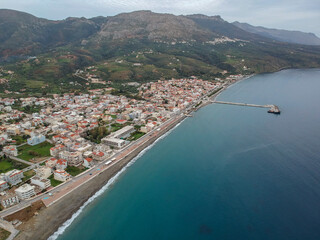 Aerial cityscape view of Neapolis town at sunset. Also named Vatika in Laconia, Greece. Neapoli is...