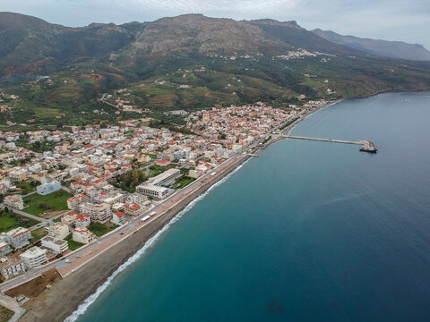 Aerial cityscape view of Neapolis town at sunset. Also named Vatika in Laconia, Greece. Neapoli is a famous coastal town built on the same site as the ancient Laconian city of Boeae