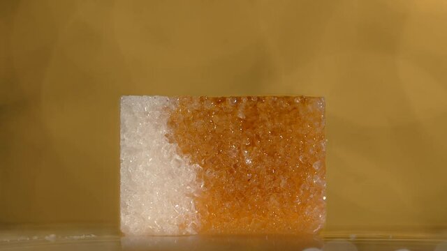 Drops of bitter falls to the lump shugar in slow motion, making of the old fashioned, Full HD 240 fps Prores HQ