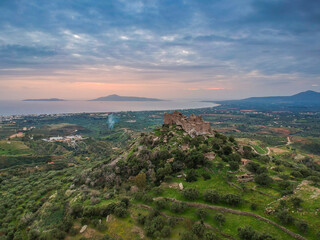 Aerial view of the Castle of Vatika or Castle of Agia Paraskevi at sunset. The castle is located in Mesohori village and has a wonderful view of Neapolis town and Elafonissos island, Laconia, Greece.