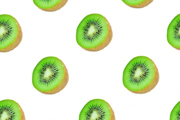 Fototapeta premium Kiwi slices pattern, top view of kiwi slices on white background.