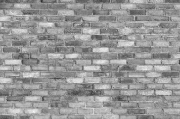 Grungy old gray brick wall, background photo