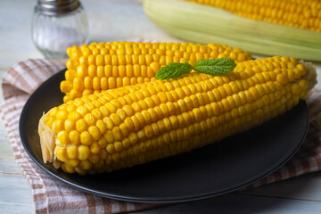 Sweet boiled corn, food concept photo