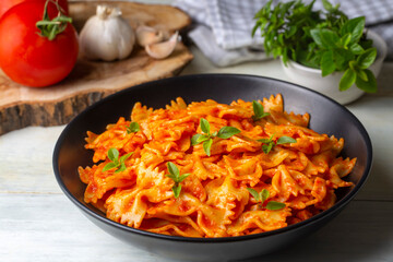 Farfalle pasta with tomato sauce, bow tie pasta tomatoes sauce (Turkish name; domatesli kelebek makarna)
