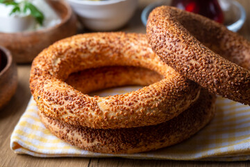 Turkish fast food bagel called Simit. Turkish bagel Simit with sesame. Bagel is traditional Turkish bakery food. Turkish name; simit - gevrek