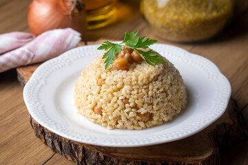 Traditional delicious Turkish food; bulgur pilaf with chickpea (Turkish name; nohutlu bulgur pilavi)