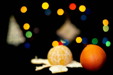 new year tangerines and garlands with bokeh