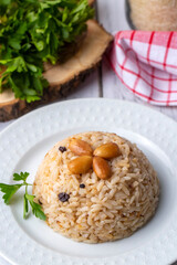 Traditional delicious Turkish food; Almond rice pilaf (Turkish name; Bademli pirinc pilavi)