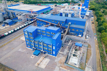 Industrial zone with factory or Plant processing of sunflower oil and oilseeds. Aerial view