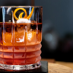Negroni cocktail in classic rock glass with frost and sublte lighting