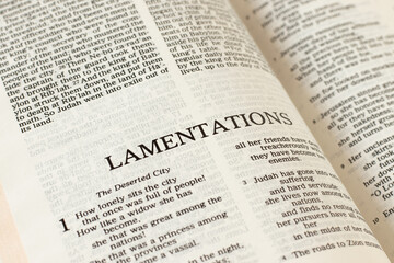 Lamentations open Bible Book. A close-up. Studying Old Testament Holy Scriptures Jeremiah prophet....