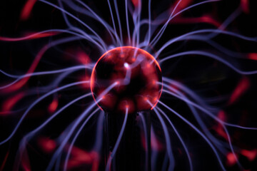 plasma lamp black background with red and purple shades in movement