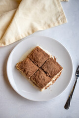Cold baklava on a dark background. Turkish sweet dessert concept. plate of sliced forest fruit...
