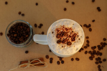 cup of coffee with cinnamon sticks