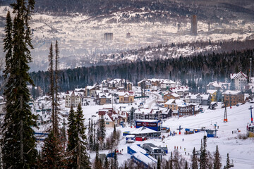Winter landscape in Sheregesh ski resort in Russia, located in Mountain Shoriya, Siberia. Ski...